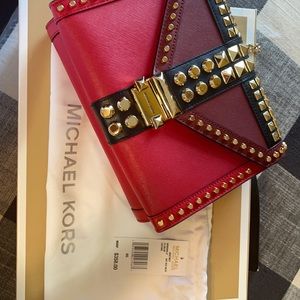 Michael Kors cross body studded bag.